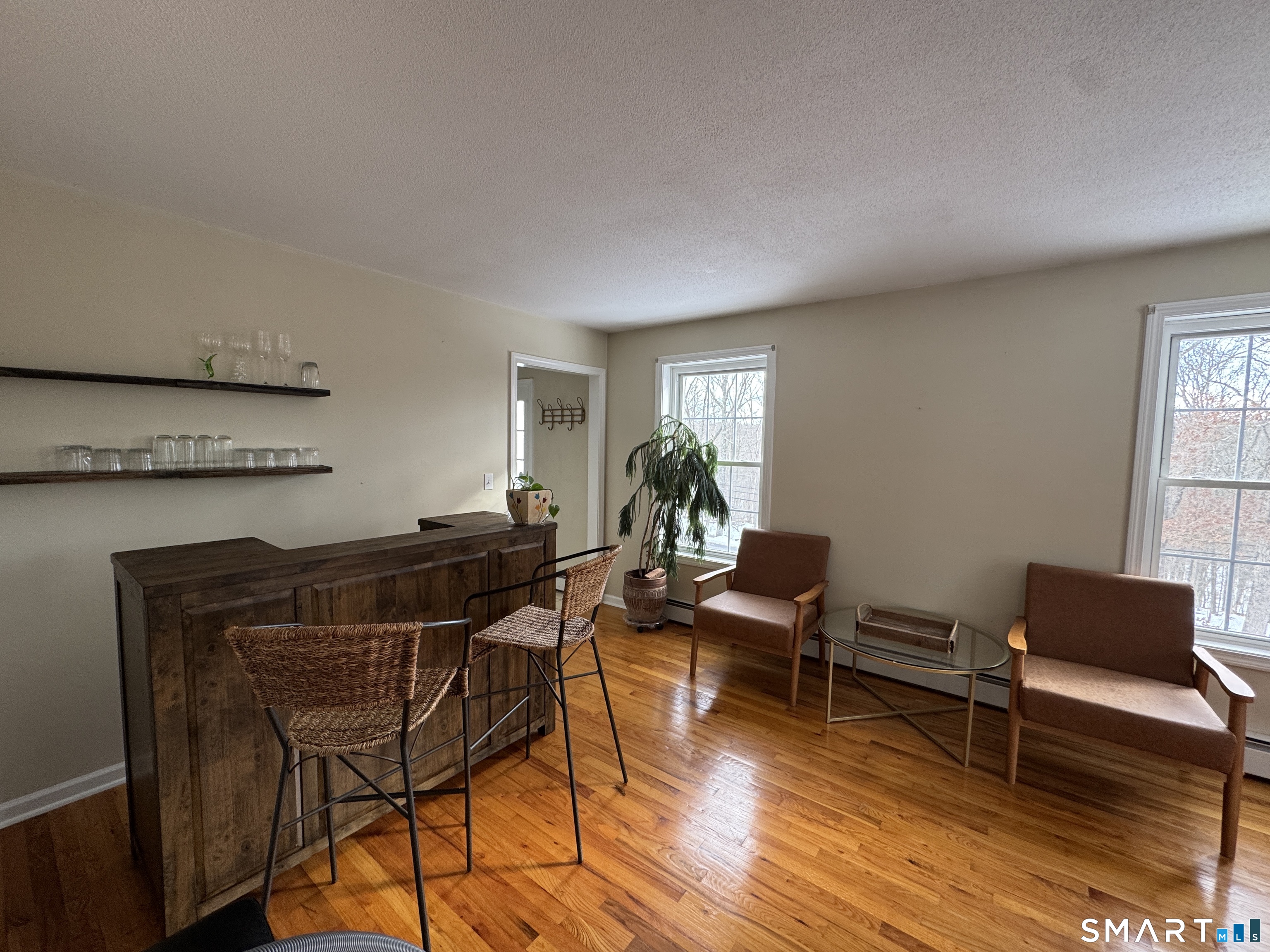 237 Chestnut Hill Road Killingworth, CT 06419 - Photo 17 of 39 a view of a livingroom with furniture and a window