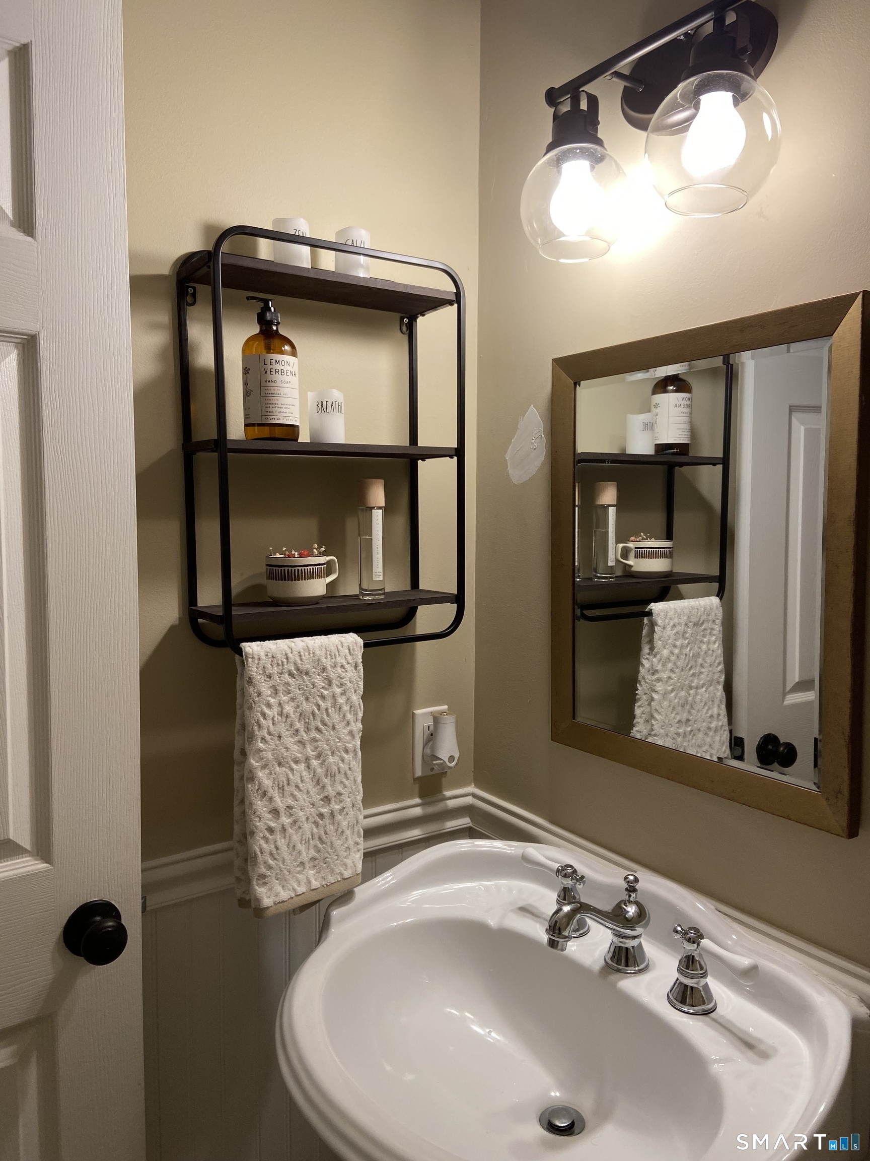 237 Chestnut Hill Road Killingworth, CT 06419 - Photo 19 of 39 a bathroom with a sink and a mirror