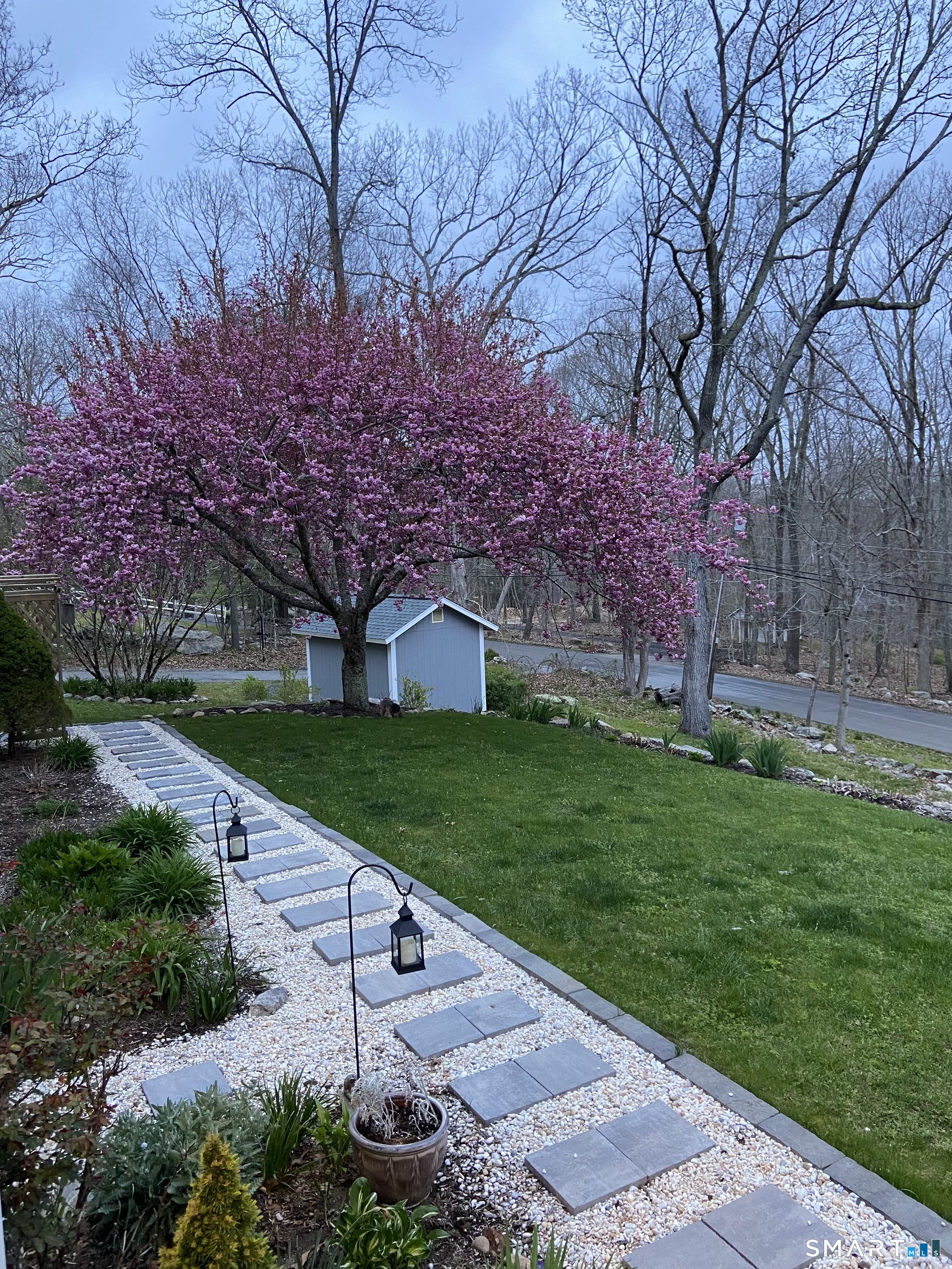 237 Chestnut Hill Road Killingworth, CT 06419 - Photo 35 of 39 a view of a patio with a yard