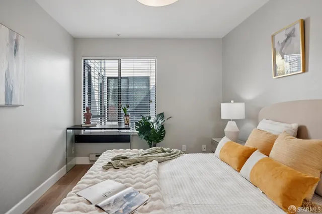 a view of a street with a building in the background