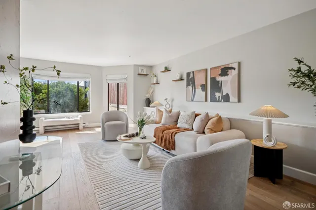 a living room with furniture and window