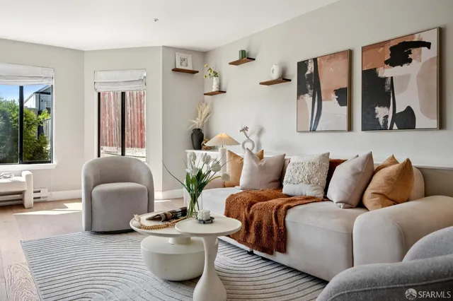 a living room with furniture and a couch