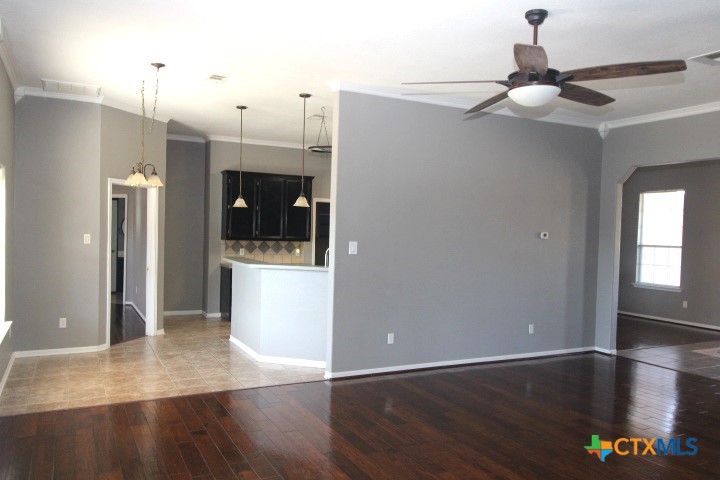 775 Cactus Lane Copperas Cove, TX 76522 - Photo 5 of 22 a view of a kitchen with a refrigerator and a stove top oven