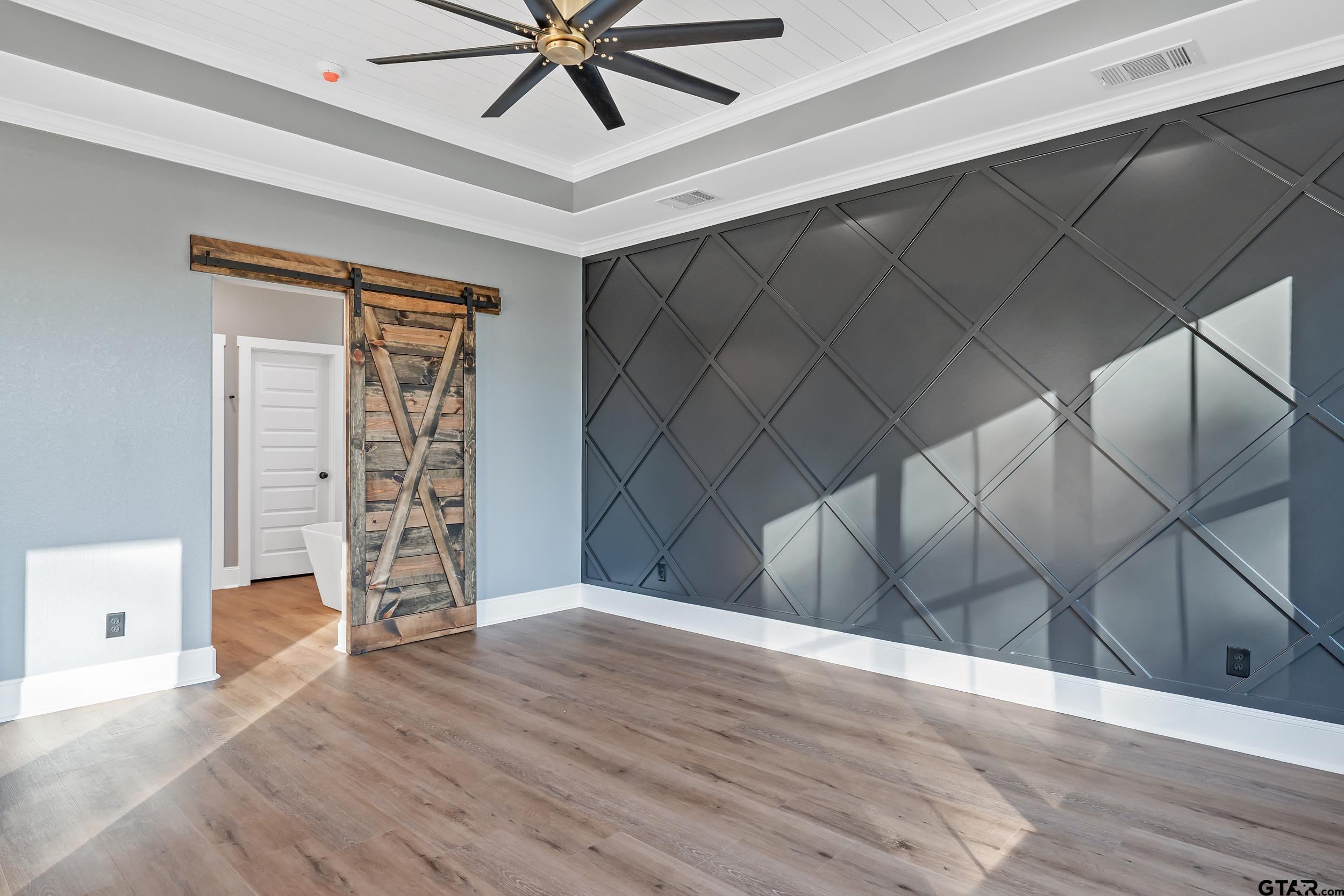 12241 Madison Crossing Bullard, TX 75757 - Photo 3 of 38 wooden floor in an empty room with a window