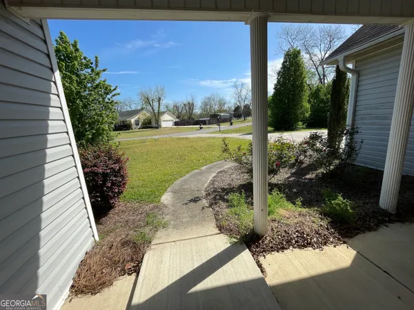 a view of a house with a porch