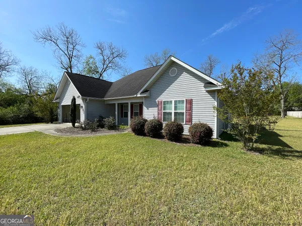 a house view with a garden space