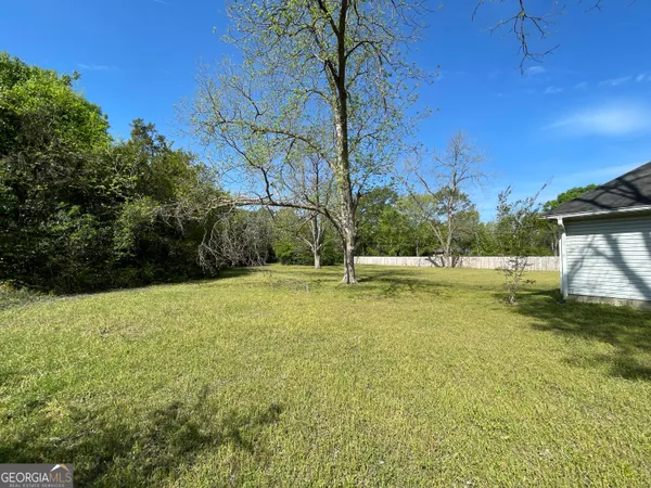 a view of an ocean with a big yard