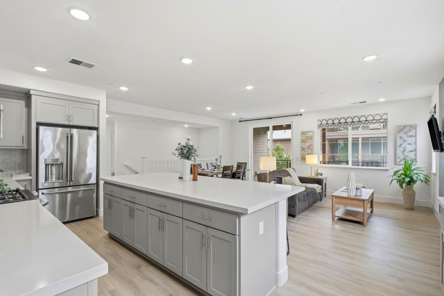 385 Line Street Hayward, CA 94544 - Photo 9 of 38 a kitchen with a sink appliances and living room