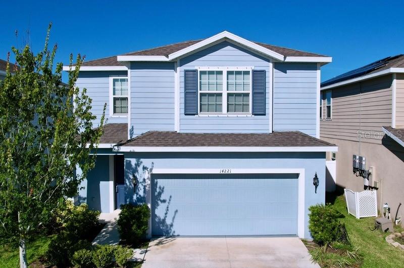 14221 Poke Ridge Drive Riverview, FL 33579 - Photo 1 of 1 a front view of a house with a garage
