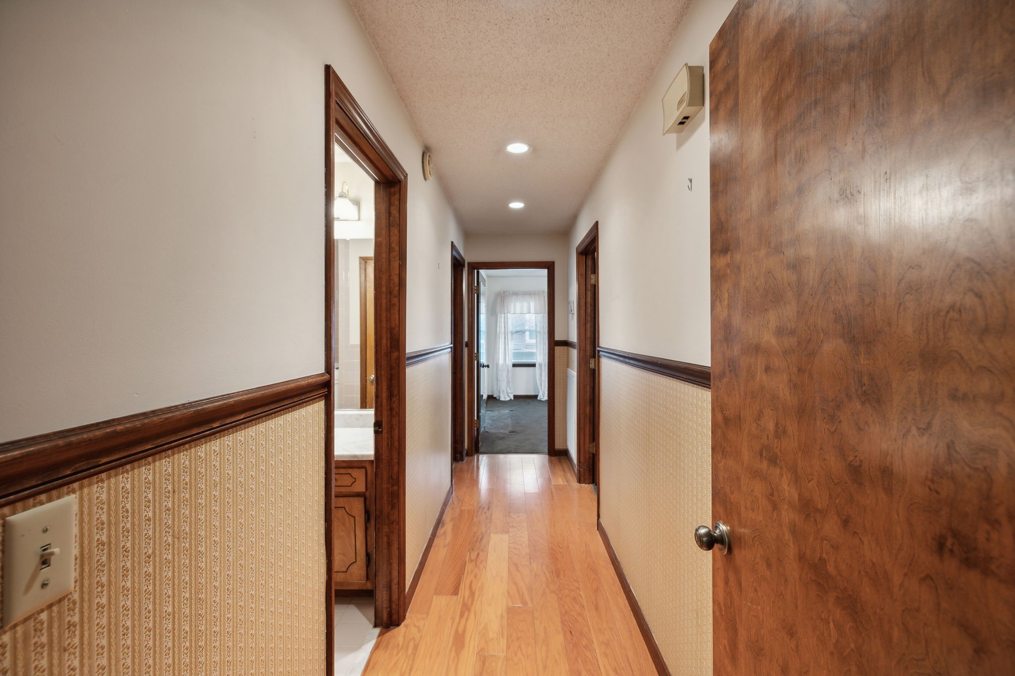 4068 Confederate Road Murfreesboro, TN 37128 - Photo 26 of 53 Hallway to the Baths & Bedrooms with the finished wood plank flooring!
