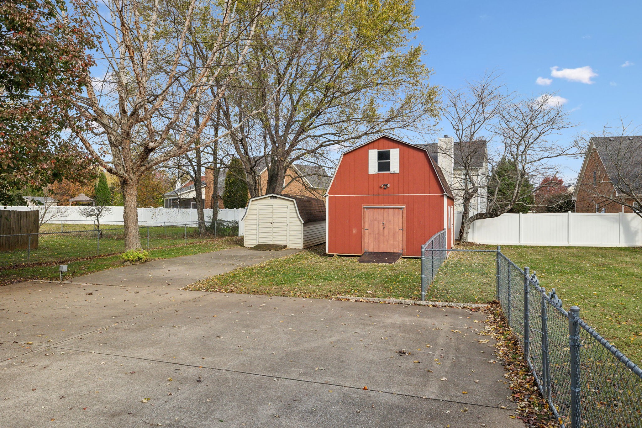 4068 Confederate Road Murfreesboro, TN 37128 - Photo 38 of 53 The storage building and the barn-style shop! Notice fenced yard to the right and plenty of parking area for 3-4 cars!