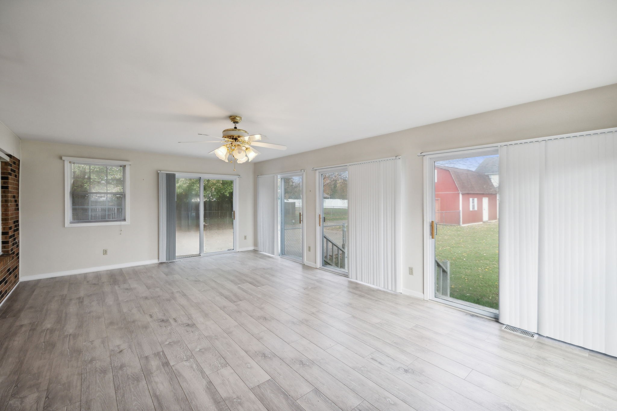 4068 Confederate Road Murfreesboro, TN 37128 - Photo 4 of 53 The attached added Sunroom with 5 sets of sliding doors and laminate flooring is a great place to relax!
