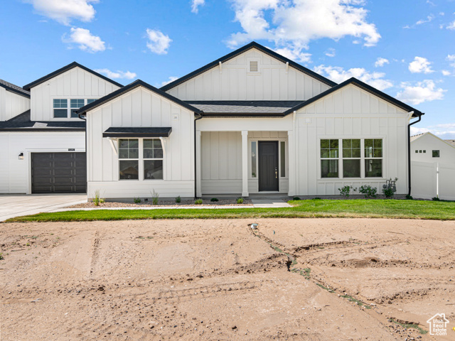 549 North Legend Circle, Unit C/466 Mapleton, UT 84664 - Photo 2 of 39 Modern inspired farmhouse with board and batten siding, concrete driveway, and a garage