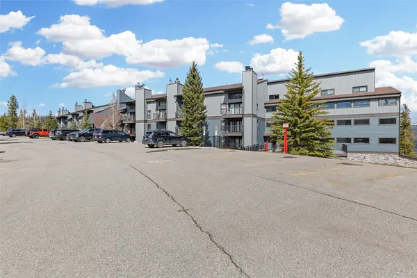 a view of a street with a building