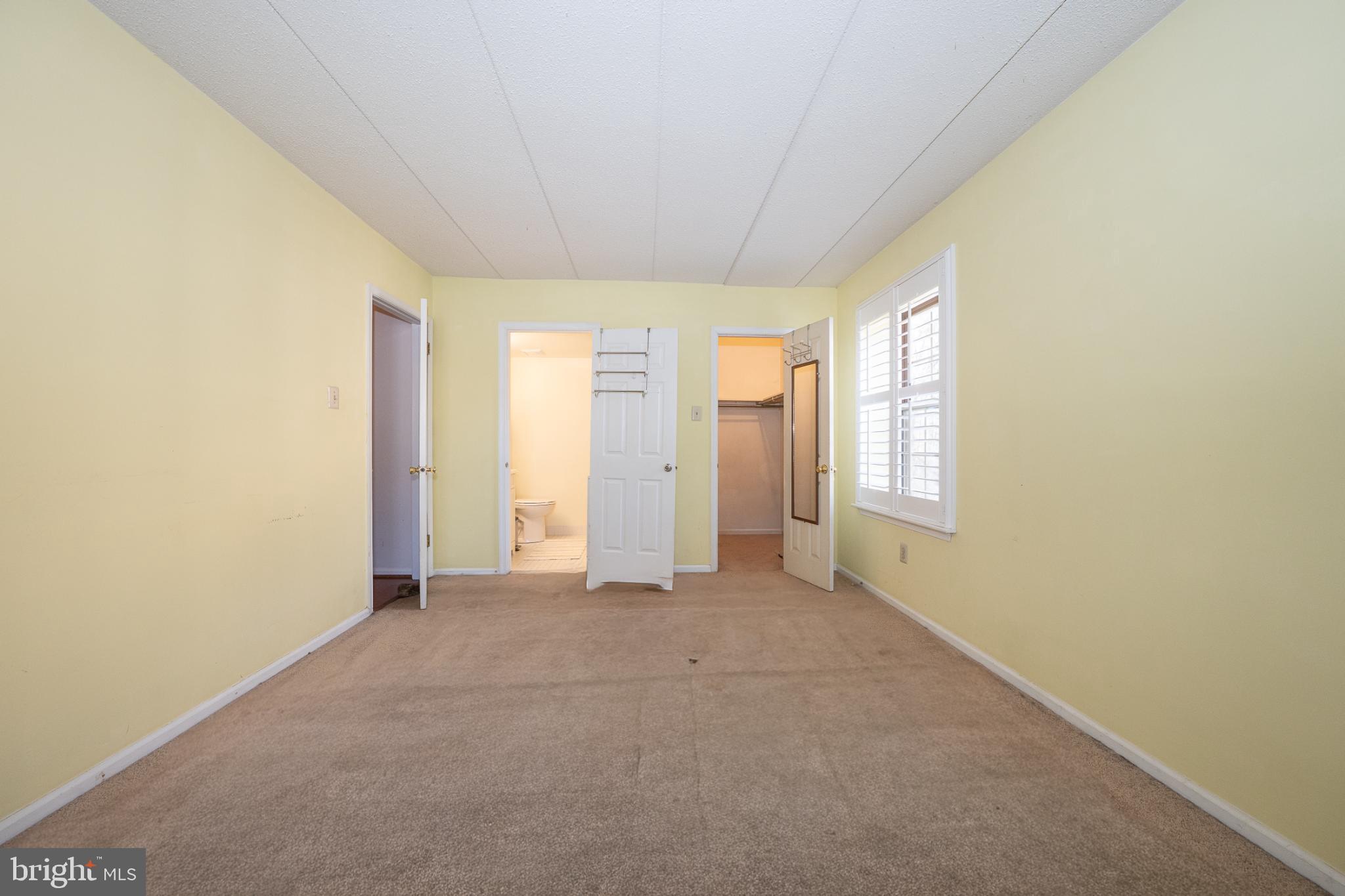 620 Washington Place, Unit 20 Chesterbrook, PA 19087 - Photo 14 of 23 an empty room with windows