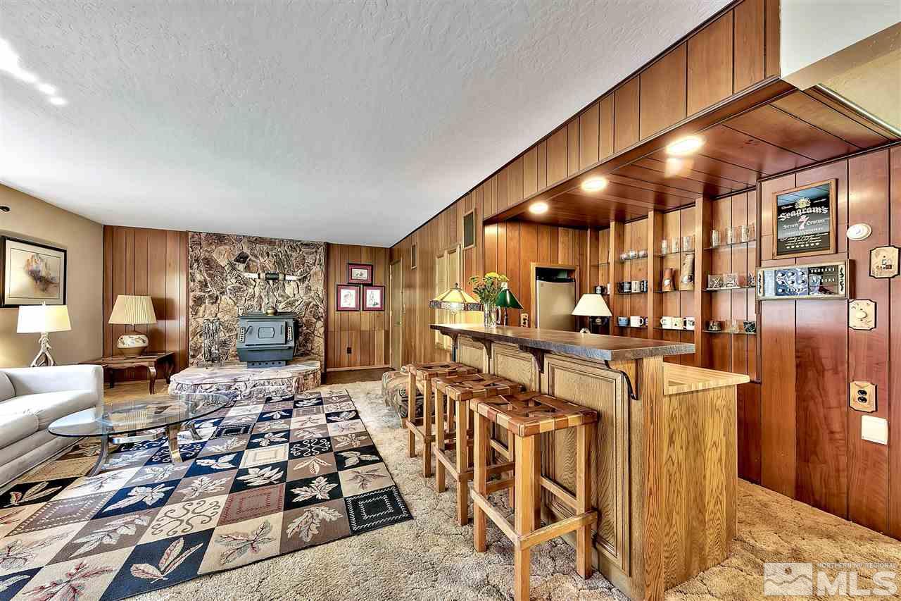 361 Summit Drive Stateline, NV 89449 - Photo 18 of 35 a very nice looking dining room with lots of chairs and wooden floor
