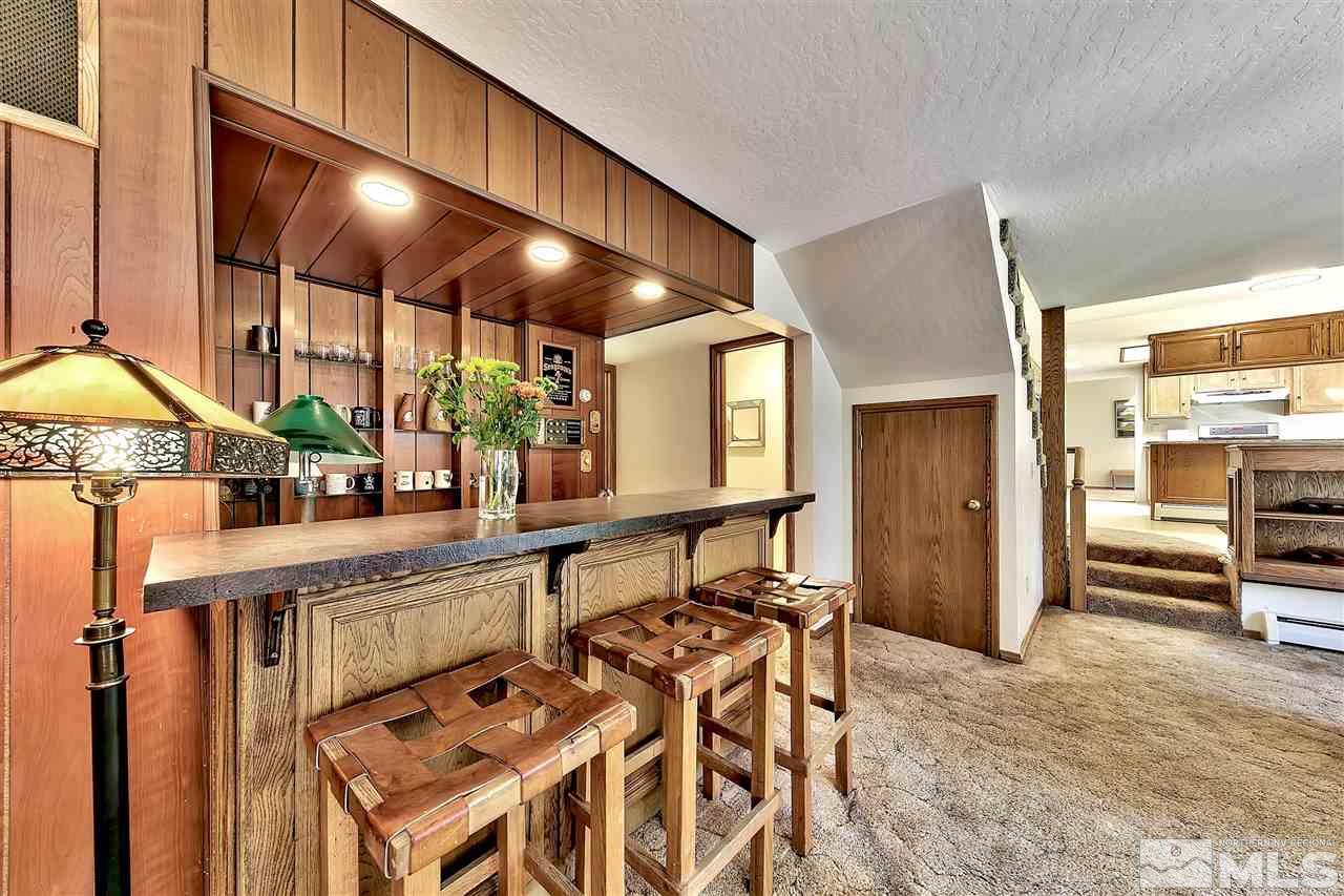 361 Summit Drive Stateline, NV 89449 - Photo 19 of 35 a very nice looking room with a large window and furniture