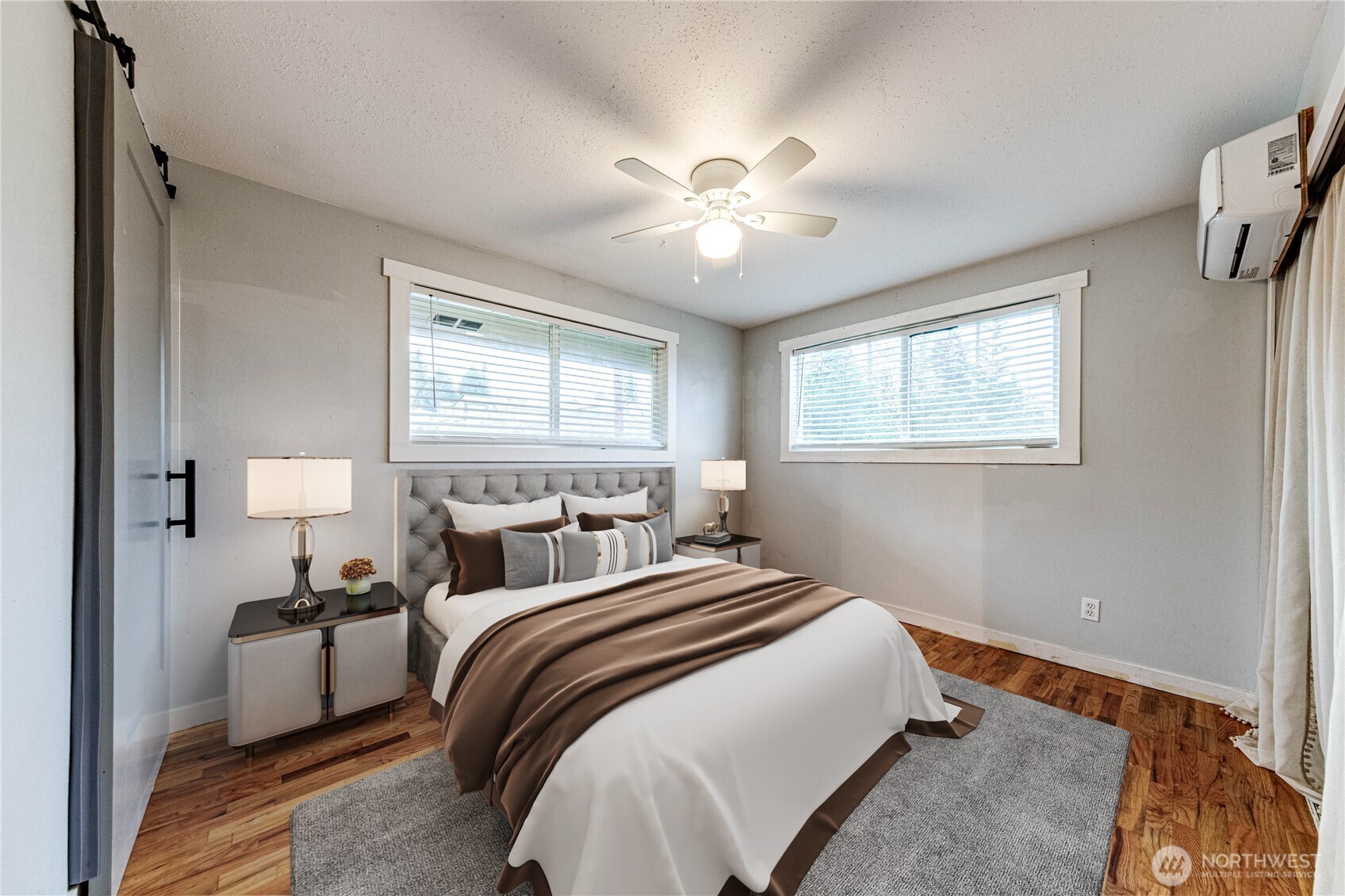 3623 Shelby Road Lynnwood, WA 98087 - Photo 14 of 39 a bedroom with a bed and a chandelier