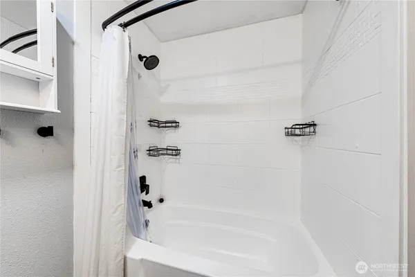 a bathroom with a bathtub