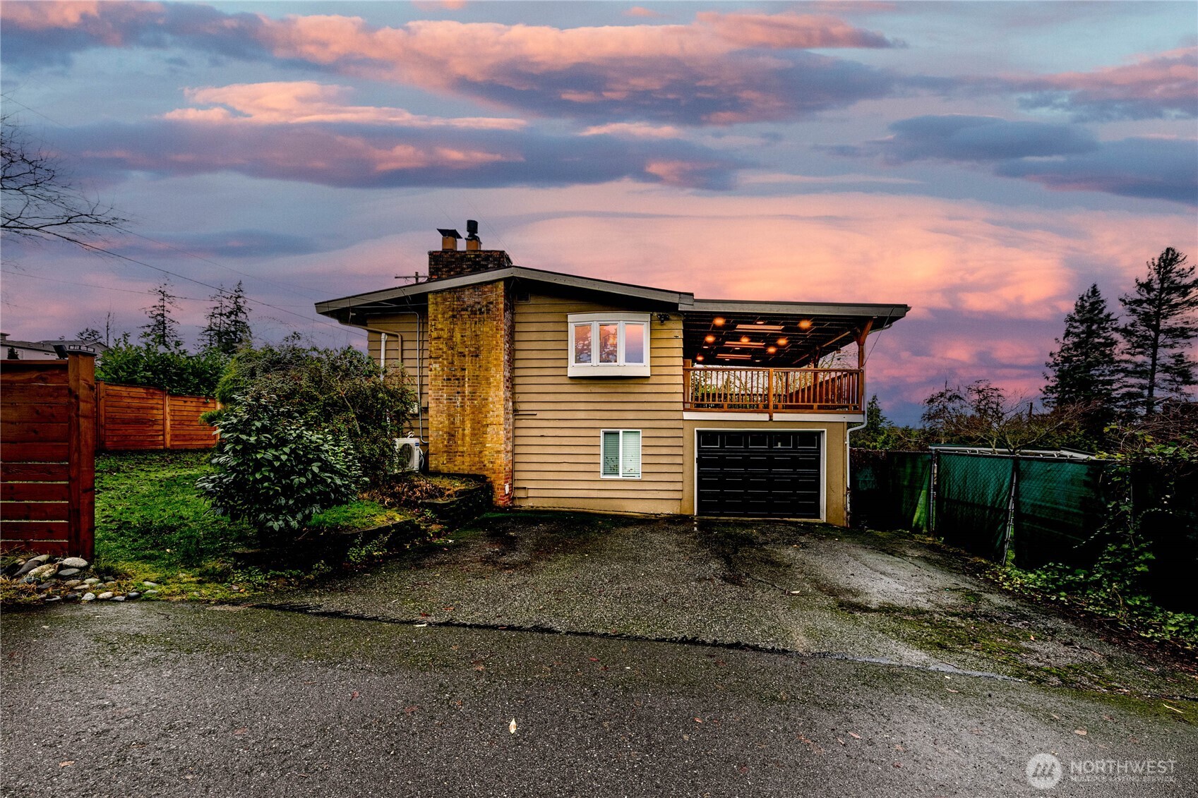 3623 Shelby Road Lynnwood, WA 98087 - Photo 38 of 39 a front view of a house with a yard
