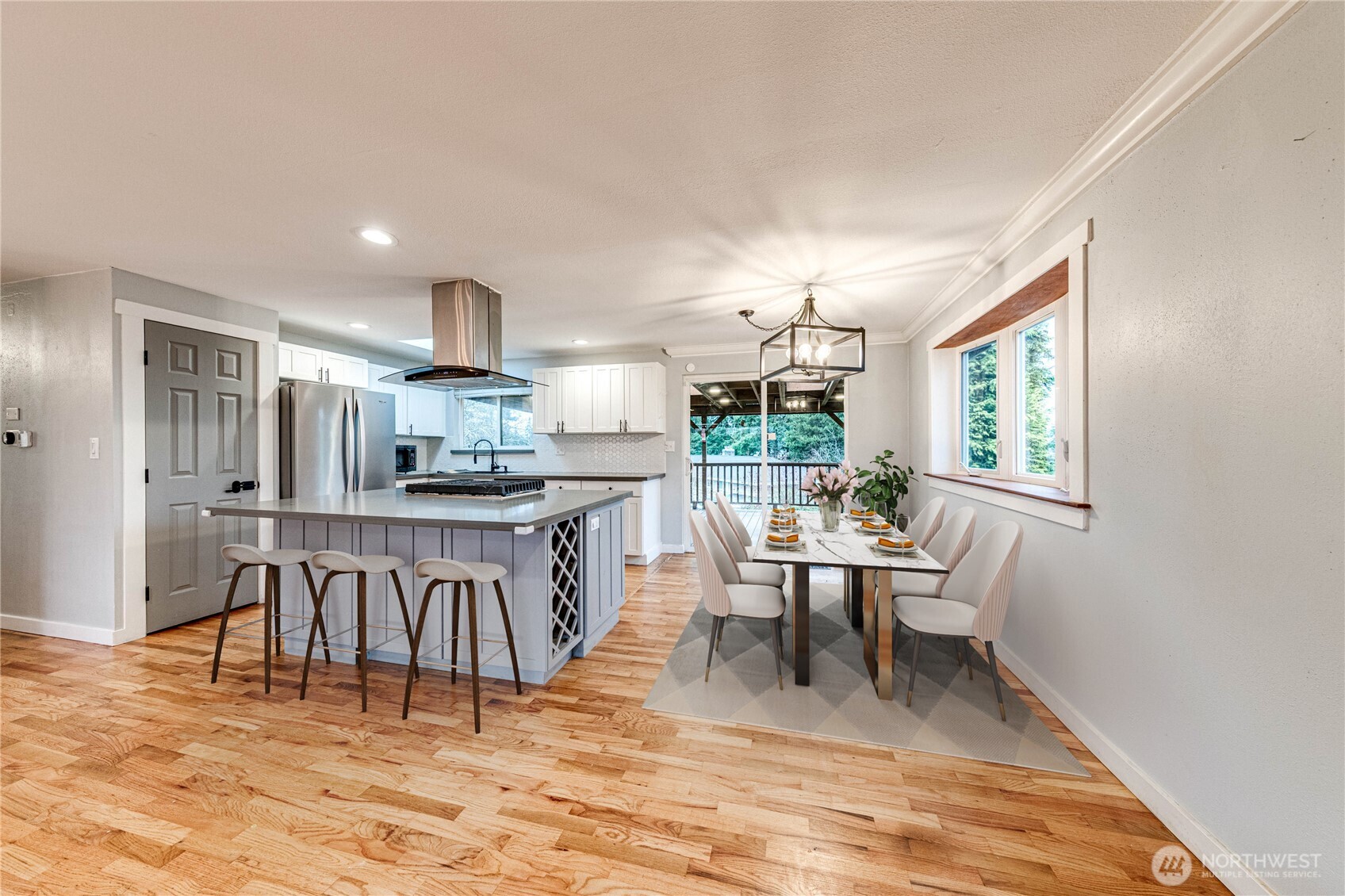 3623 Shelby Road Lynnwood, WA 98087 - Photo 7 of 39 a view of a dining room with furniture window and wooden floor