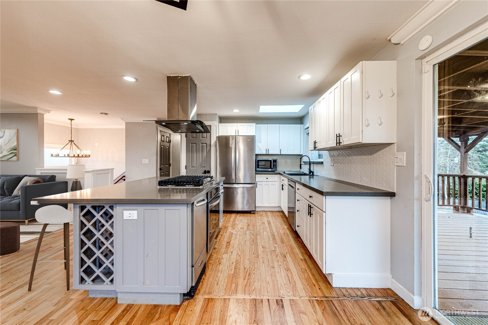 3623 Shelby Road Lynnwood, WA 98087 - Photo 8 of 39 a kitchen with stainless steel appliances granite countertop a sink stove and refrigerator