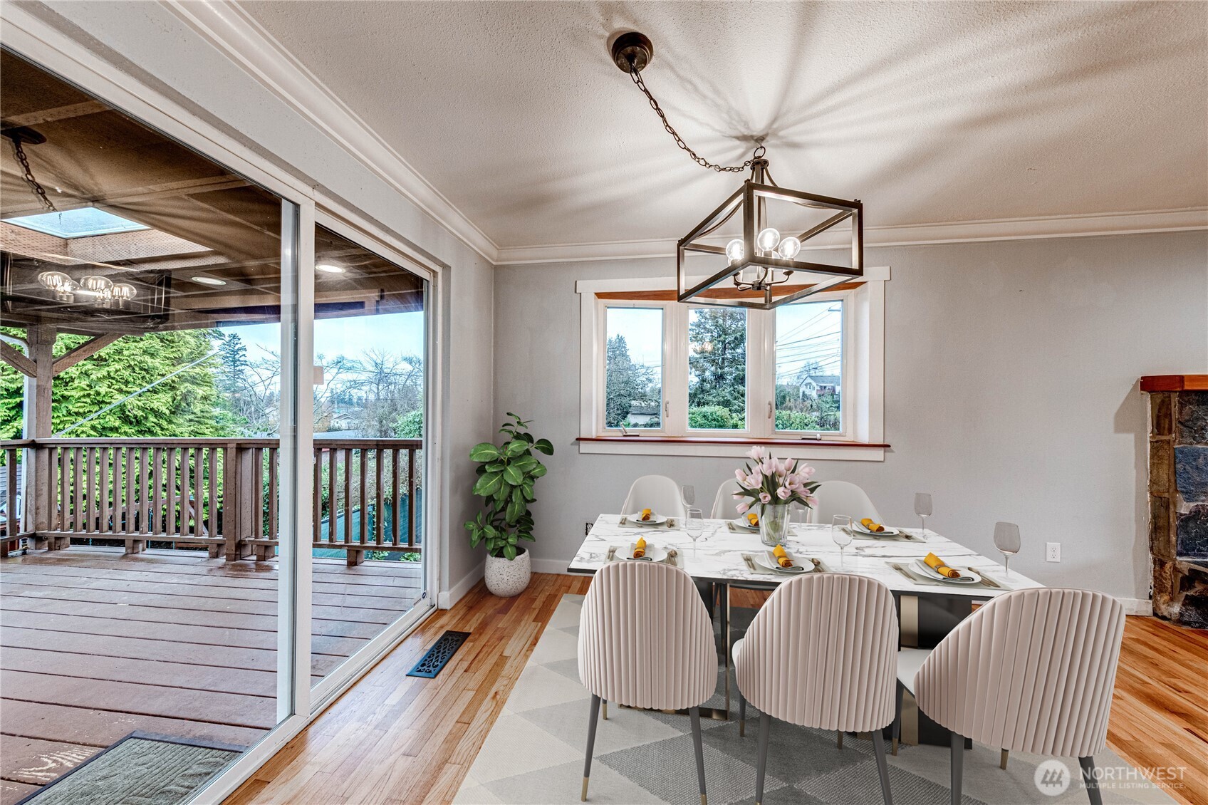3623 Shelby Road Lynnwood, WA 98087 - Photo 9 of 39 a view of a dining room with furniture wooden floor and a chandelier