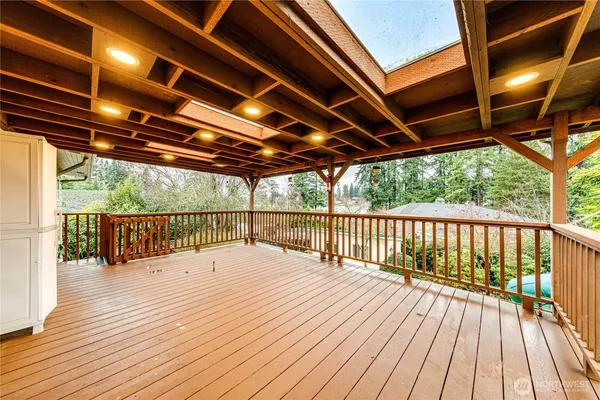 a view of balcony with wooden floor