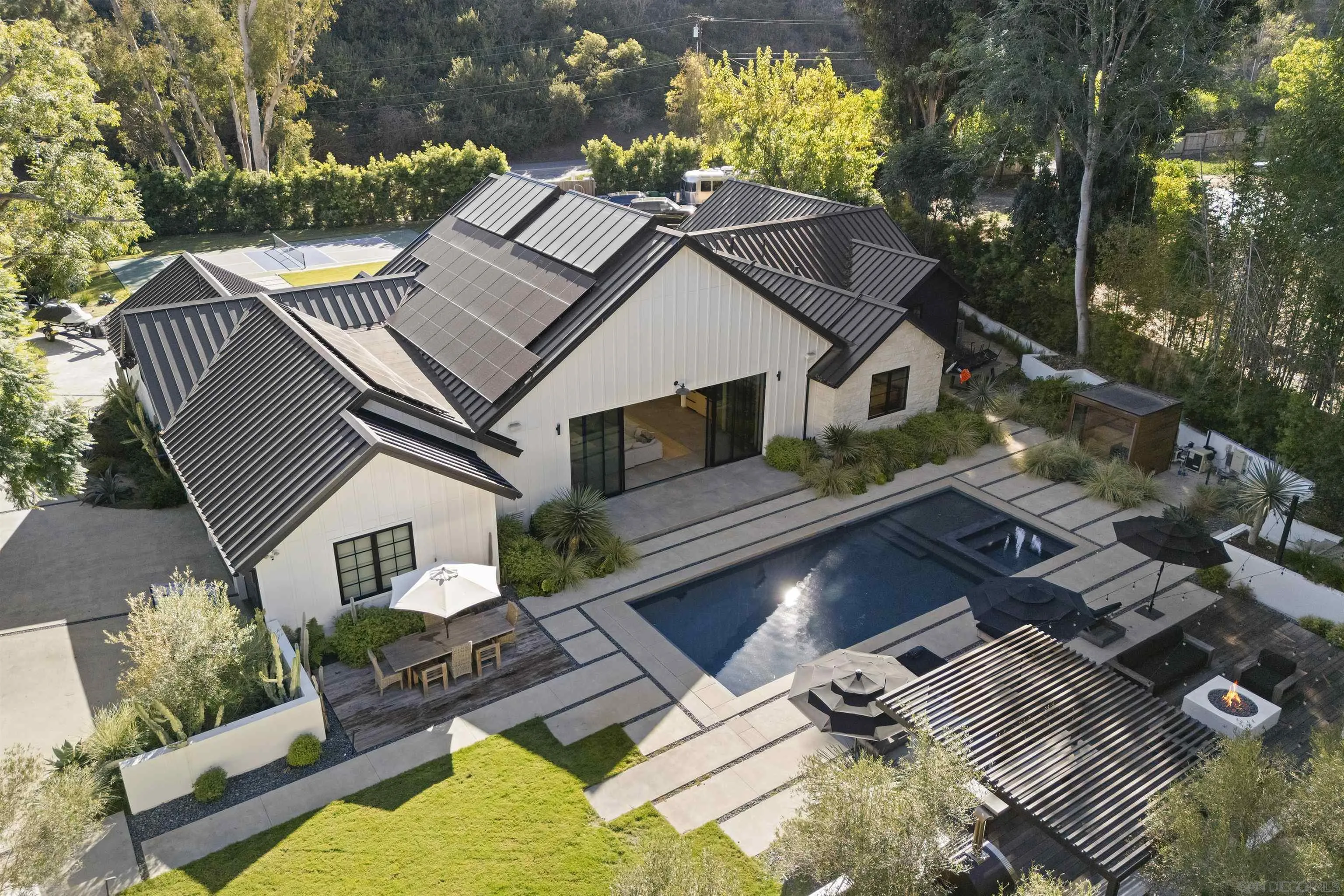 4874 Sun Valley Road Del Mar, CA 92014 - Photo 1 of 42 a aerial view of a house with a yard
