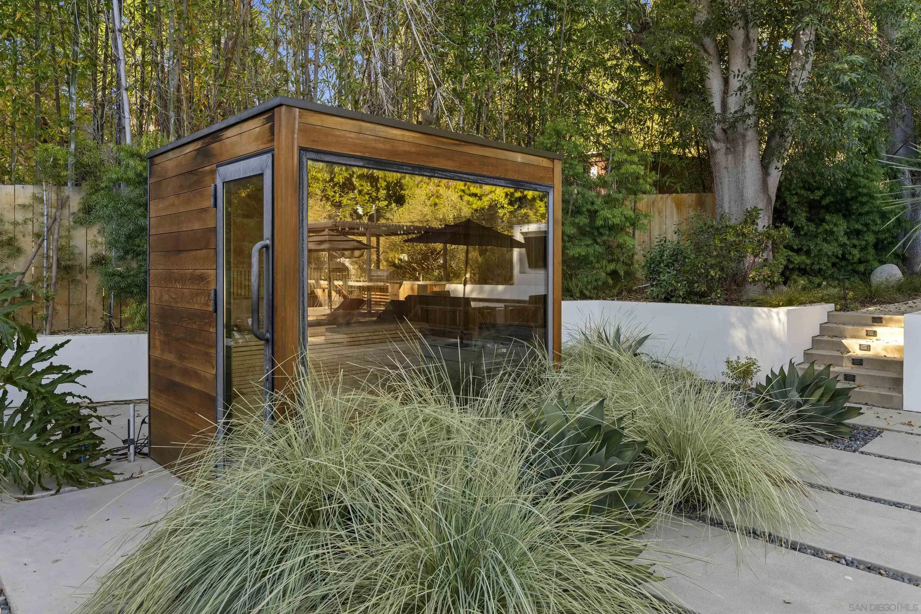 4874 Sun Valley Road Del Mar, CA 92014 - Photo 37 of 42 a front view of a house with garden