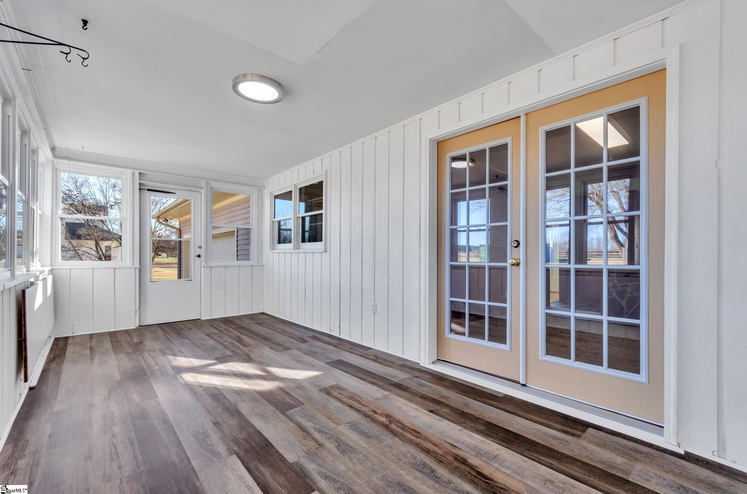 3180 Highway 357 Lyman, SC 29365 - Photo 33 of 50 Laminate floors with built-in tables