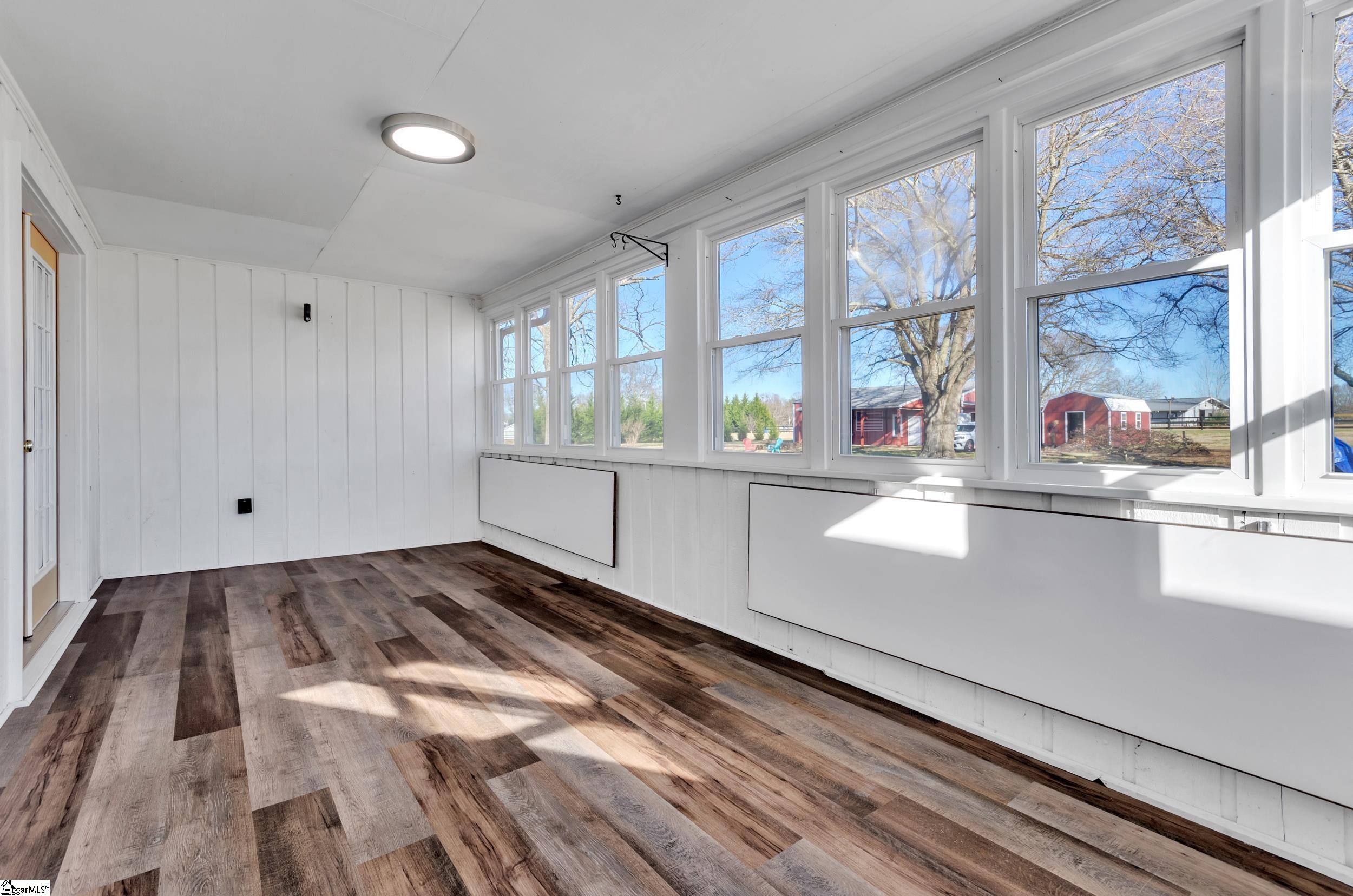 3180 Highway 357 Lyman, SC 29365 - Photo 34 of 50 Laminate floors with built-in tables