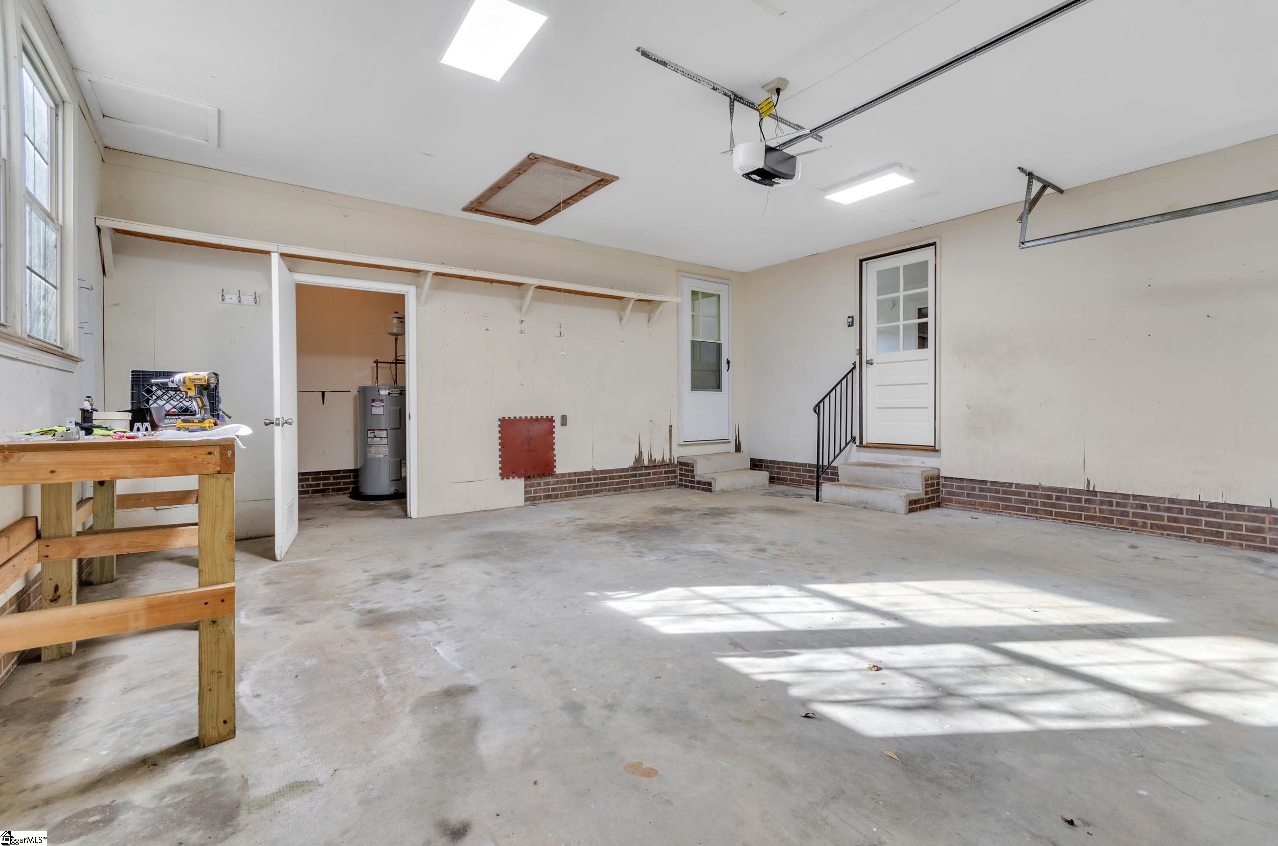 3180 Highway 357 Lyman, SC 29365 - Photo 35 of 50 Large storage room off garage & walkable attic area above. New garage door opener.