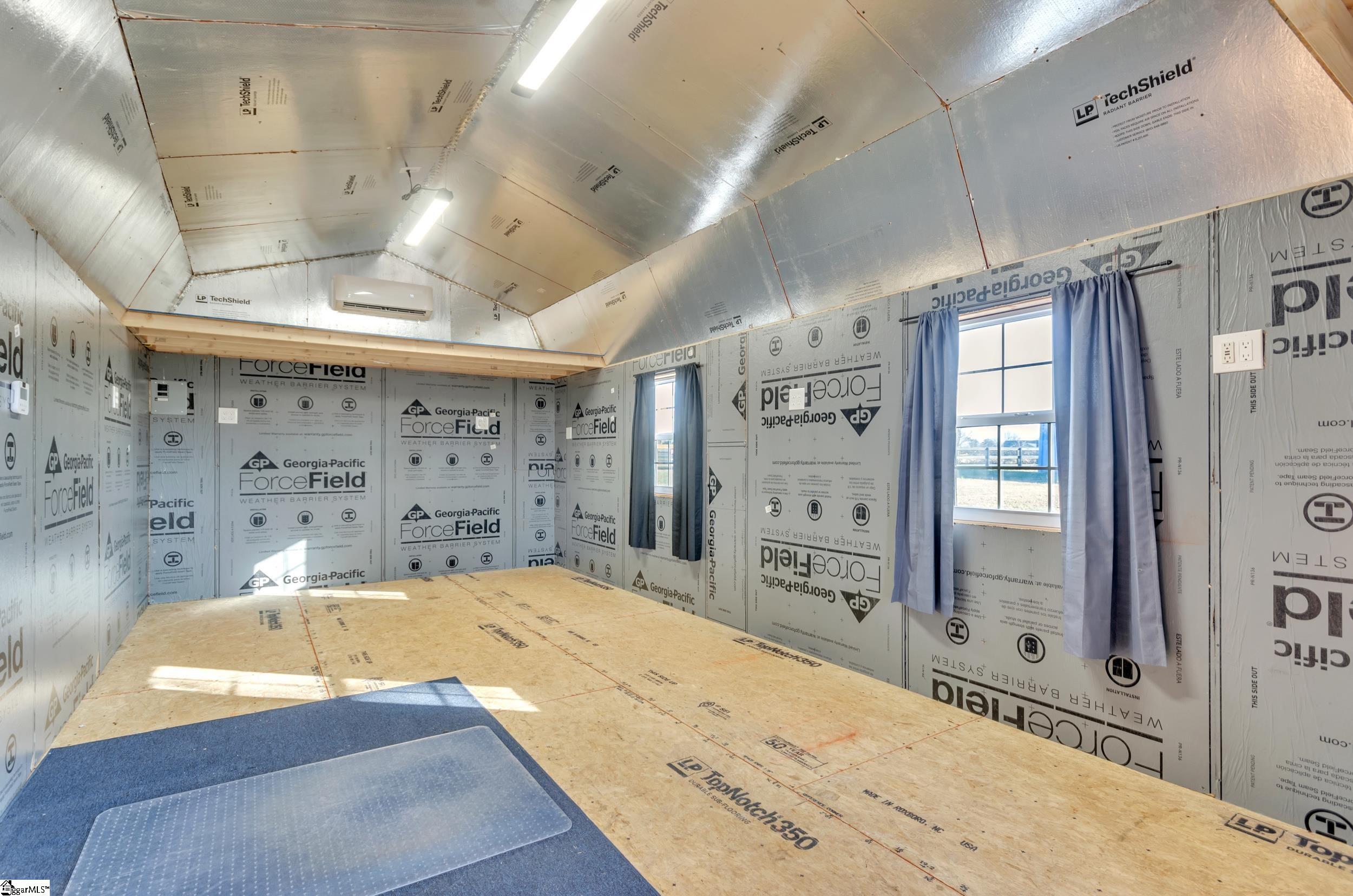 3180 Highway 357 Lyman, SC 29365 - Photo 45 of 50 12'x24' with Mr. Cool mini-split system. 110 & 220 electrical service, outlets, lighting, windows & breaker panel. Keystone for hardline internet hookup. Insulated ceilings & walls, weatherproof moisture barriers & lockable door.