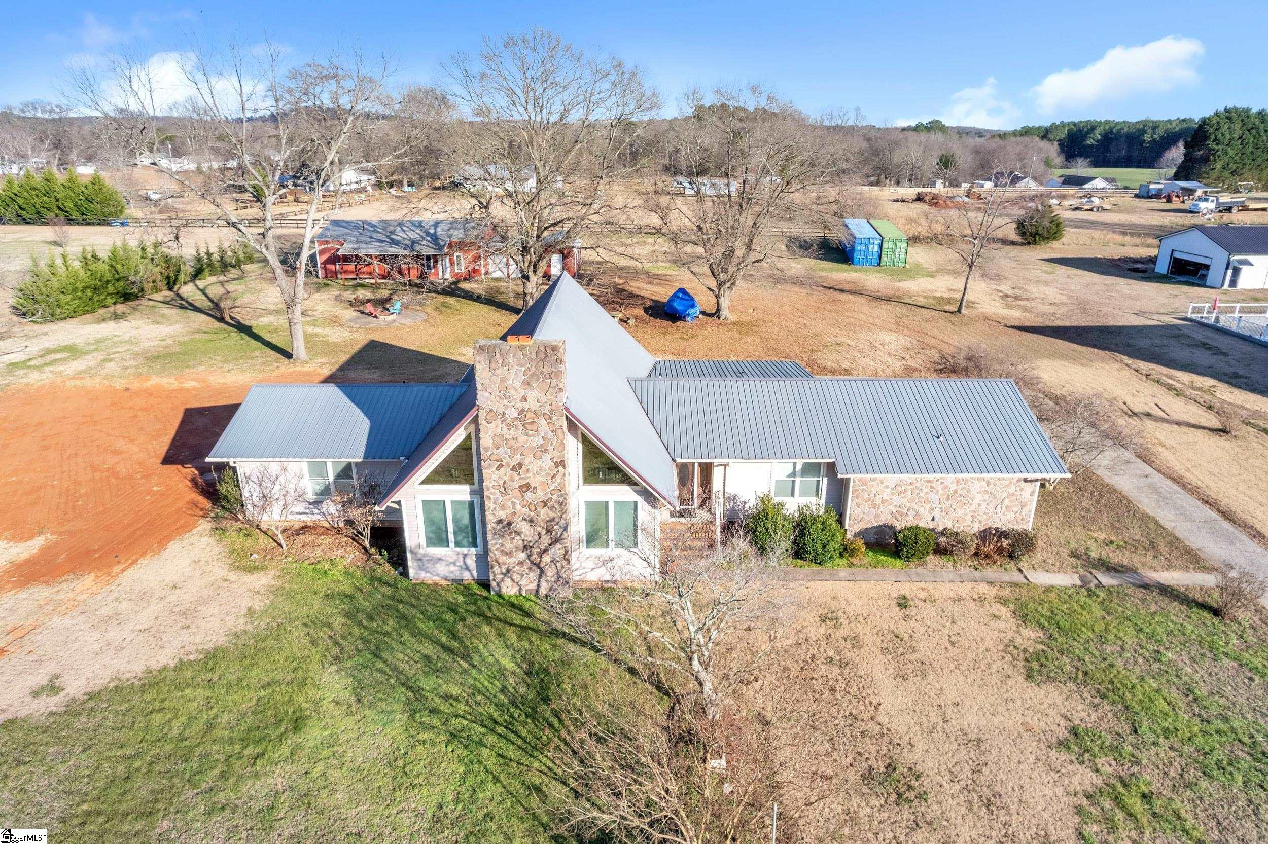 3180 Highway 357 Lyman, SC 29365 - Photo 46 of 50 The new red dirt area is the location of the new septic lines.