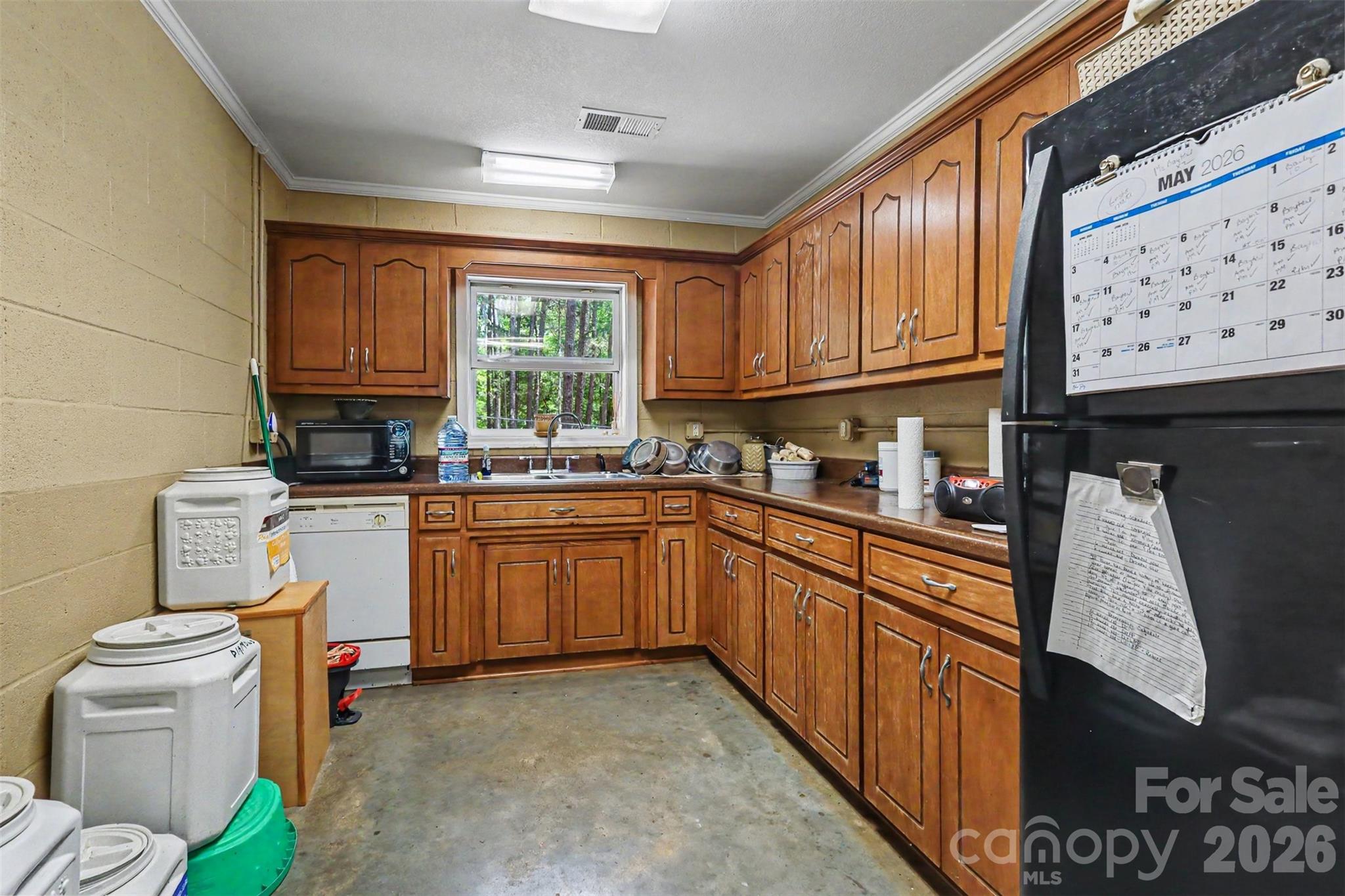 4037 Old Williamston Road Belton, SC 29627 - Photo 31 of 41 a kitchen with granite countertop a sink stove and cabinets