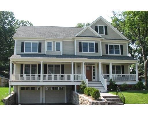 375 Hillcrest Road Needham, MA 02492 - Photo 1 of 32 a front view of a house with a yard