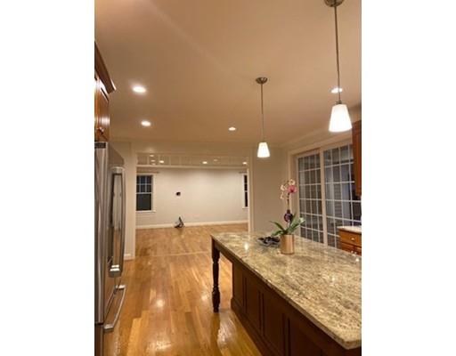 375 Hillcrest Road Needham, MA 02492 - Photo 12 of 32 a kitchen with granite countertop a sink and a counter top space