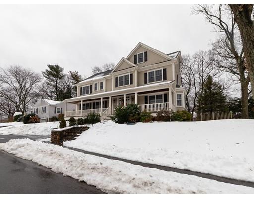 375 Hillcrest Road Needham, MA 02492 - Photo 13 of 32 a front view of a house with a yard covered with snow