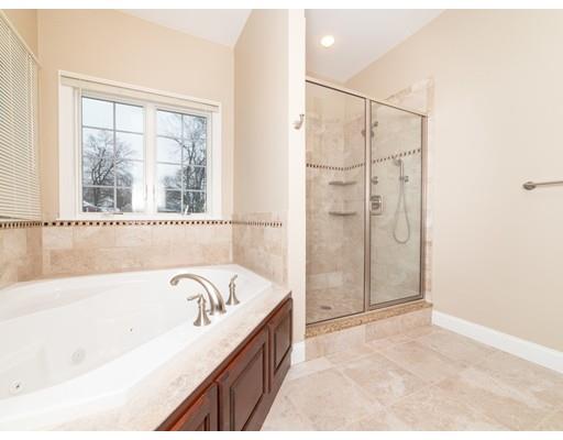 375 Hillcrest Road Needham, MA 02492 - Photo 22 of 32 a bathroom with a bathtub and a shower