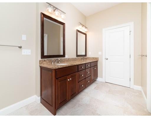 375 Hillcrest Road Needham, MA 02492 - Photo 23 of 32 a bathroom with a granite countertop sink and a mirror