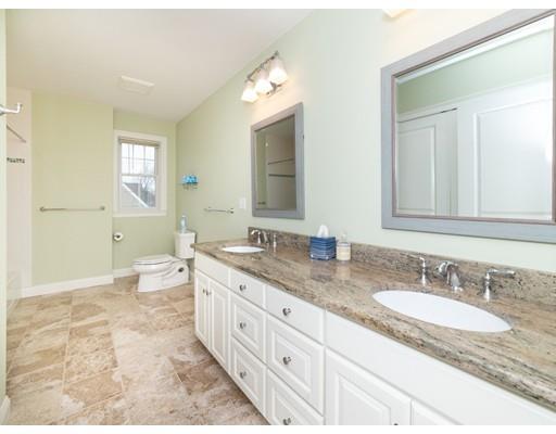 375 Hillcrest Road Needham, MA 02492 - Photo 25 of 32 a bathroom with a granite countertop double vanity sink a mirror and a