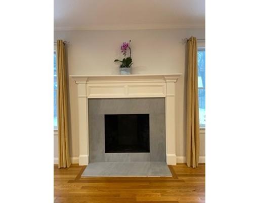 375 Hillcrest Road Needham, MA 02492 - Photo 9 of 32 a living room with a fireplace