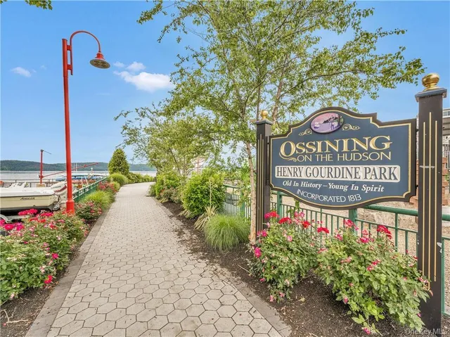 a sign on the side of a road