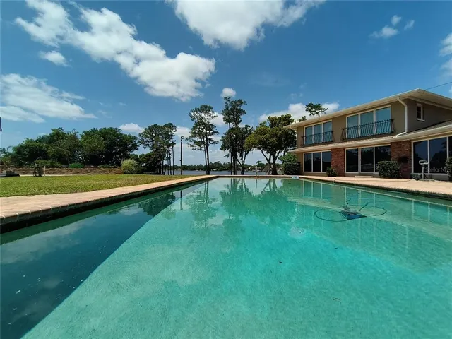 a view of a house with a big yard