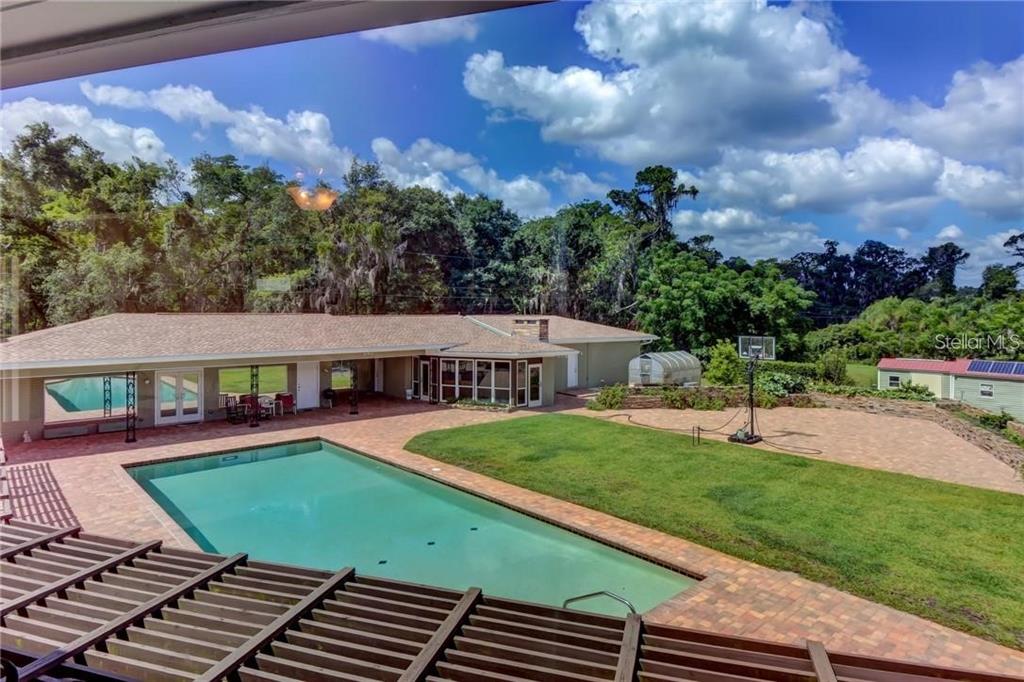 910 North Kepler Road DeLand, FL 32724 - Photo 24 of 52 a view of a yard in front of the house