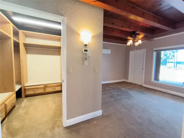 a bathroom with a shower and a sink