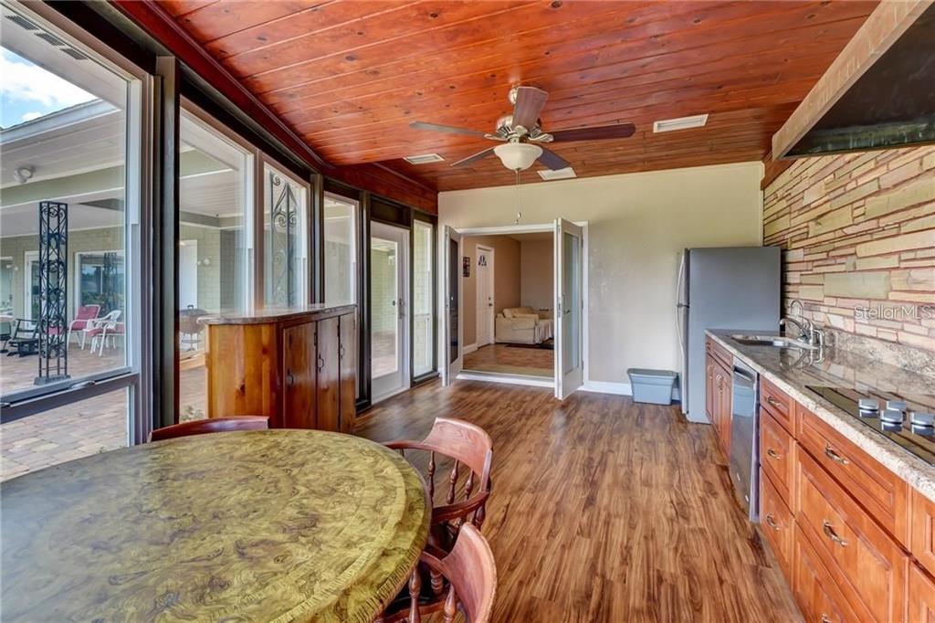 910 North Kepler Road DeLand, FL 32724 - Photo 36 of 52 a view of a livingroom with furniture and staircase