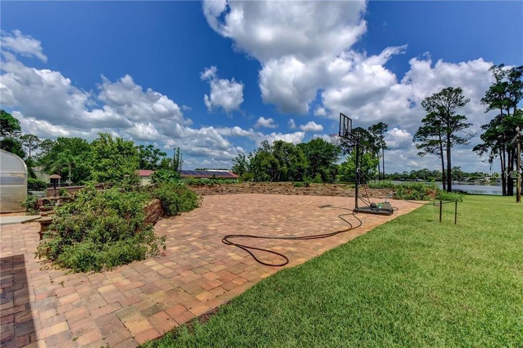 910 North Kepler Road DeLand, FL 32724 - Photo 43 of 52 a view of a backyard