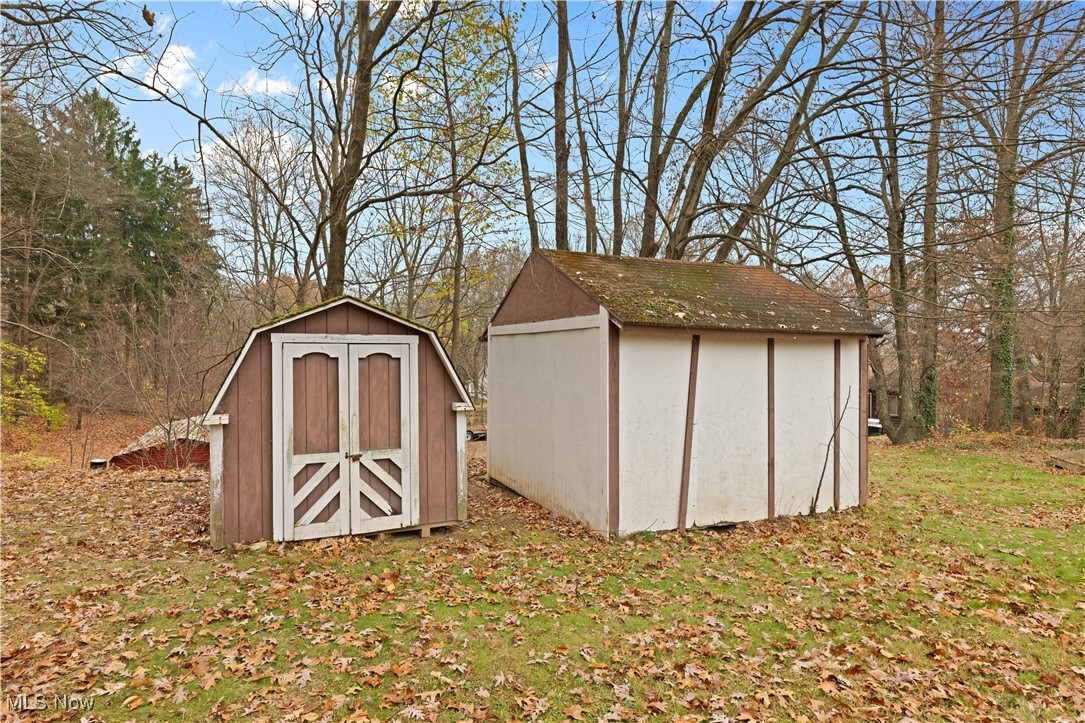 1574 Faye Road Akron, OH 44306 - Photo 38 of 45 View of outdoor structure featuring a lawn